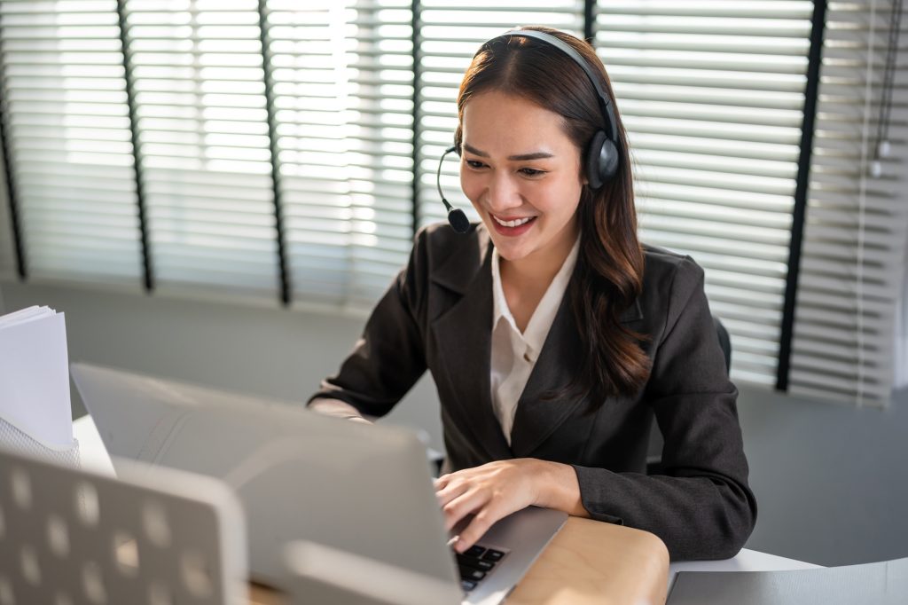 Asian beautiful businesswoman call center working in office workplace.